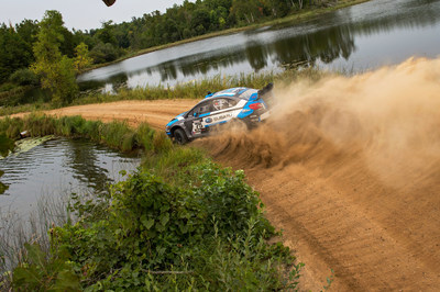 David Higgins and Co-Driver Craig Drew Sliding Between Lakes in Northern Minnesota at the Ojibwe Forest Rally