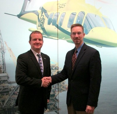 Michael Loeffler, VP of Supply Chain for Bell Helicopter and Tim Kirk, VP of Sales for TCA Agreement signing at Bell Headquarters in Ft. Worth, TX.