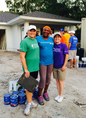Valspar joins Habitat for Humanity of Pinellas County to dedicate Valspar Championship home on September 23, 2015 for a single mom and her two kids. Keys to the Habitat home in St. Petersburg, Florida will be presented to homeowner Rolanda Lawrence (center) and her children. During a build day in August, Rolanda was joined by Tracy West (left), Valspar Championship Tournament Director, and Kimberly Welch (right), Valspar Vice President of Communications and President of the Valspar Foundation...