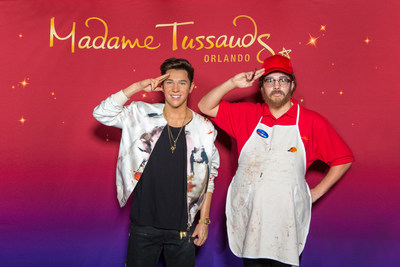 Teen sensation and pop artist Austin Mahone played a practical joke on a few of his unwitting fans this week at Madame Tussauds Orlando. Disguised as a Madame Tussauds employee, Mahone offered to take photos and videos for his fans as they posed next to his newly unveiled wax figure, before revealing himself to the surprised attraction guests.