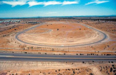 The former U-Haul Technical Center 1.25-mile test track in Tempe, Ariz., circa 1977, is pictured here. U-Haul International, Inc. has signed on as the Official Trailer and Propane of Phoenix International Raceway for the NASCAR race week in November, where the final four drivers in The Chase for the Sprint Cup will be determined. U-Haul will promote and educate race fans on safe trailering and safe propane usage just outside PIR's one-mile oval track.