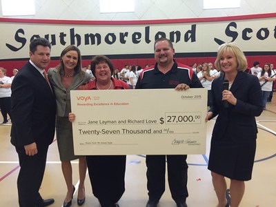 Voya Financial executives award teachers Jane Layman and Richard Love from Southmoreland Middle School in Scottdale, Pennsylvania with the first place prize for the 2015 Voya Unsung Heroes grant program, Friday October 30, 2015