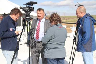 Rudi Roeslein discusses the largest livestock waste-to-energy project of its with reporters at Smithfield Hog Production's Ruckman Farm in Northwest Missouri. Roeslein announced the $120 million project will begin placing Renewable Natural Gas (RNG) into a national pipeline in Summer 2016.