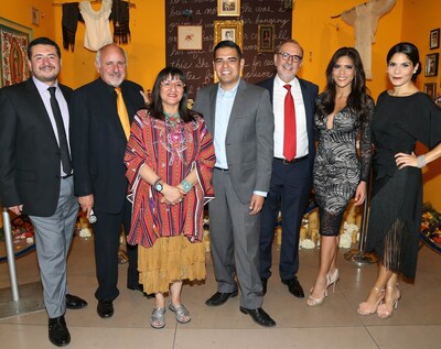 Sandra Cisneros (third from left) unveils her altar installation titled "A Room of Her Own" at the Museum of Latin America Art's "Fotos y Recuerdos" Day of the Dead gala alongside (from l to r) Gilberto Gutierrez, Senior Brand Manager for HERDEZ(R) Brand at MegaMex Foods; Stuart A. Ashman, President & CEO of MOLAA; Robert Garcia, Mayor of Long Beach, Calif.; Carlos M. Sada, Consul General of Mexico in Los Angeles; Francisca Lachapel, Host of Univision's "Despierta America" morning show; and Cristy...
