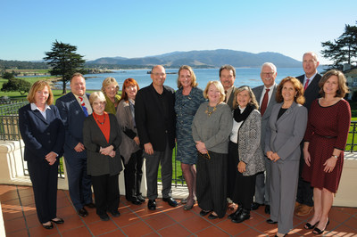 Pebble Beach Company CEO William Perocchi and Pebble Beach Concours Chairman Sandra Button with representatives from the charitable partners of the Concours. (Photo by Lee Ann Seber Holm, courtesy of Pebble Beach Concours d'Elegance)