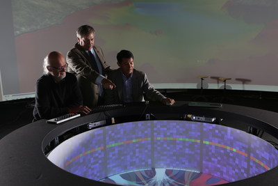 Rensselaer Polytechnic Institute (RPI) Curtis R. Priem Experimental Media and Performing Arts Center Director Johannes Goebel (left), Rensselaer Chief Information Officer and Vice President for Information Services and Technology John Kolb (middle), and IBM Research scientist and lab leader Hui Su (right) explore data with Campfire, as part of the Cognitive and Immersive Systems Laboratory.