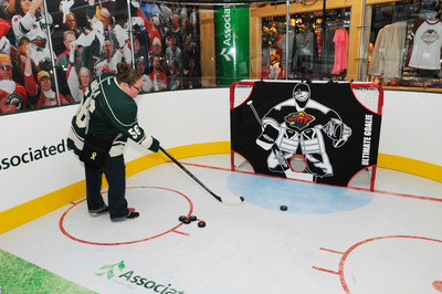 Fans are invited to enjoy Associated Bank's Power Play Zone fan challenge at Xcel Energy Center at all Wild home games.