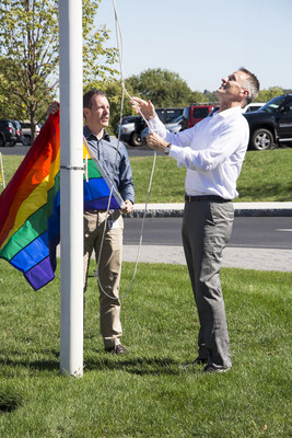 Boston Scientific CEO Mike Mahoney raising the rainbow flag in honor of LGBT History Month.
