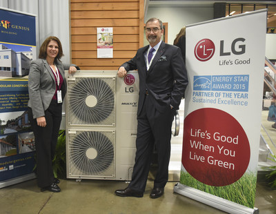 Senior Manager, Sustainability and CSR, Christine Ackerson, left, and Senior Vice President, LG Air Conditioning Systems, Kevin McNamara, right, stand next to an energy efficient LG HVAC system at the Greenbuild International Conference & Expo on Wednesday, Nov. 18, 2015 in Washington. LG, one of the Energy Star(R) Partner of the Year 2015, is also a sponsor of the Greenbuild International Conference & Expo. (Kevin Wolf/AP Images for LG Electronics)