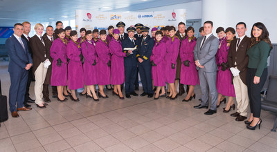 The flight crew of Etihad Airways' inaugural A380 flight after arriving at New York's John F. Kennedy International Airport from Abu Dhabi, including the Butlers who exclusively serve guests of The Residence by Etihad, the only three-room suite in the sky. The crew is joined by Martin Drew, Senior Vice President, The Americas; Pieter Nel, Airport Manager, JFK; Vincent Frascogna, Vice President, Eastern USA; and Suzanne Alipourian, Area Manager, Airport Operations, The Americas (executives from left to right).