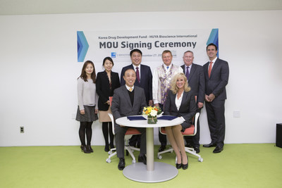 HUYA Bioscience International Expands into South Korea - photo from left to right: Ms. JungSuk Shin, Ms. Hailey Jung, Dr. Sanghoon Shin, Dr. Dennis Gillings, Dr. Bob Goodenow, Mr. Clem Gingras and (sitting in the chairs) Dr. Sang Aun Joo and Dr. Mireille Gillings, HUYA's founder, CEO & Executive Chairman.