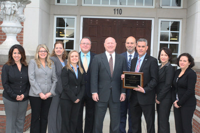 The Delaware County Bank's new Small Business Lending Division flanks Martin Golden, Columbus District Director of the U.S. Small Business Administration (fifth from right). The SBL Division will be headed by John Tonjes (third from right) and Dan Bywater (fourth from right).