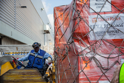 Offloading Ebola relief supplies from Direct Relief to aid in response efforts.