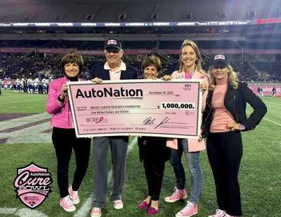 AutoNation's Mike & Alice Jackson presenting a $1 MILLION check to BCRF's Myra Biblowit at the Inaugural AutoNation Cure Bowl in Orlando, Florida on December 19, 2015.