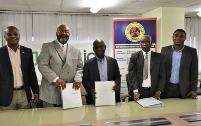 Contract signing ceremony at ECG headquarters