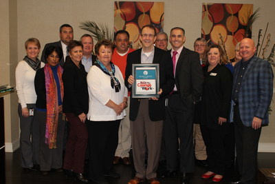 Representatives from Wind Creek Hospitality pictured with award.