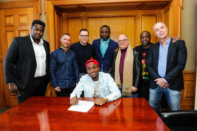 Sony Music Entertainment Sign Nigerian Musician Davido - Pictured (L to R): Adewale Adeleke, Chairman, HKN Records; Adam Granite, President, Northern & Eastern Europe and Africa, Sony Music International; Dusko Justic, Vice President, International Marketing, Sony Music International; Kamal Ajiboye, Manager for Davido; Joel Katz, Chairman Media & Entertainment, Greenberg Traurig; Efe Ogbeni, Executive Producer / Head A&R, Regime Music Societe; Sean Watson, Managing Director, Sony Music Africa...