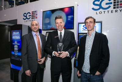 Jim Kennedy, center, Scientific Games Group Chief Executive of Lottery, accepts the company's award for 