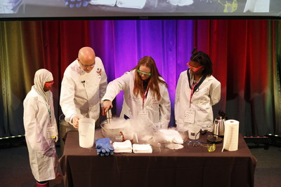 Former White House Executive Pastry Chef Bill Yosses demonstrates the science behind chocolate mousse at Covestro's first greenlight for girls Day at Carnegie Science Center.