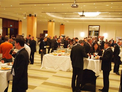 Attendees at last year's Unmanned Systems Europe Conference participate in a catered networking session.