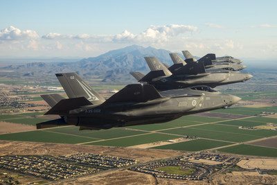 Four F-35 Lighting II aircraft fly over Luke Air Force Base, Arizona. The F-35 fleet recently surpassed 50,000 flight hours.