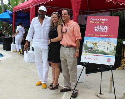Steve Harvey with Angel and Gary Rutty, Managing Director of Comfort Suites Seven Mile Beach