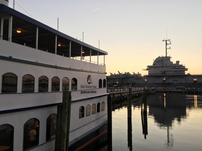 Wounded veterans and guests enjoy an evening on Spirit of Carolina.