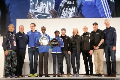 The Abbott World Marathon Majors (AbbottWMM) Series IX champions, Eliud Kipchoge of Kenya and Mary Keitany of Kenya, are pictured (left to right) with Tad Hayano, Race Director, Tokyo Marathon; Nick Bitel, Chief Executive, London Marathon; Mark Milde, Race Director, BMW Berlin Marathon; Tim Hadzima, General Manager, Abbott World Marathon Majors; Elaine Leavenworth, Senior Vice President, Chief Marketing and External Affairs Officer at Abbott; Peter Ciaccia, New York Road Runners President of Events and Race Director of the TCS New York City Marathon; Carey Pinkowski, Executive Race Director, Bank of America Chicago Marathon; and Tom Grilk, Executive Director, Boston Athletic Association, at the conclusion of the 2016 Tokyo Marathon (February 28, 2016).  Kipchoge and Keitany will split a $1 million prize purse, which was determined based on a points system from qualifying races during a one-year scoring period.