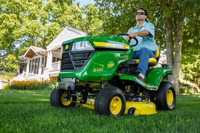 The John Deere X330 Select Series Tractor Mower offers more horsepower while maintaining a clean cut.