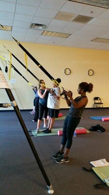 Wounded Warrior Project Alumni utilize TRX training methods during a recent Physical Health and Wellness event.