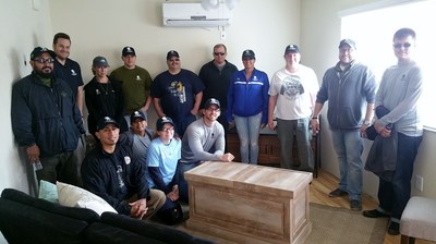 Wounded Warrior Project Alumni help furnish a home meant to help a homeless veteran.