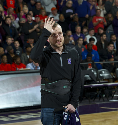 Wounded veteran honored during Northwestern University basketball game.