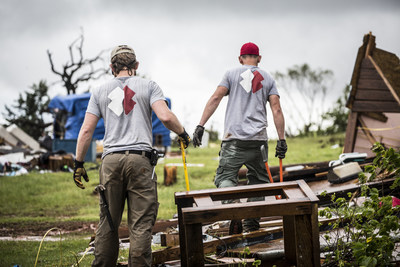 Team Rubicon volunteers clear debris after a storm.Photo courtesy of Team Rubicon.