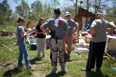 Team Rubicon assess the damage during a disaster response operation in Louisburg, Mississippi.