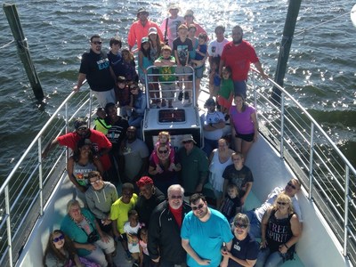 Wounded veterans and their families enjoy dolphin cruise.