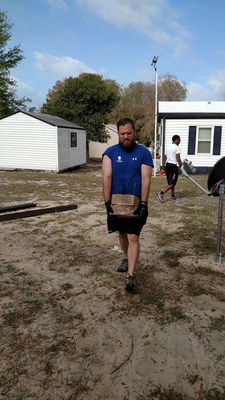 Wounded Warrior Project Alumni and The Mission Continues renovate a veterans home during a service project.