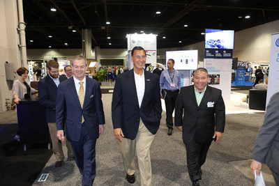 AUVSI President and CEO Brian Wynne walks the show floor with Congressman Frank Lobiondo (R-NJ).