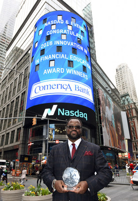 Irvin Ashford, Jr., Senior Vice President and Community Development and External Affairs Director for Comerica Bank, accepts the Innovation in Financial Education Award presented by Nasdaq and EverFi on behalf of the bank.