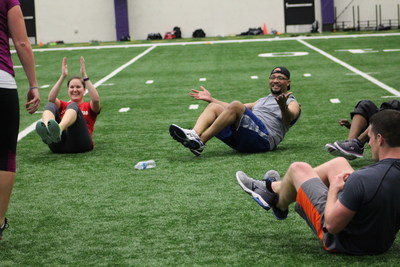 Wounded Warrior Project Alumni have a laugh at the Baltimore Ravens' Under Armour Performance Center, as part of WWP's Physical Health and Wellness (PH&W) program.