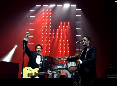 Brandon Flowers w. Wayne Newton at T-Mobile Arena Grand Opening. Photo credit Kevin Winters Getty. ABA: Mr. Las Vegas, Wayne Newton, joined The Killers during their set for a collaboration of "Johnny B. Goode." Photo credit: Kevin Winters / Getty