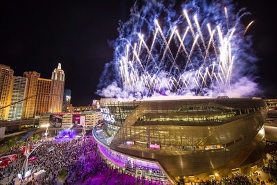 Crowd watching fireworks for grand opening of T-Mobile Arena, photo credit Tony Tran Photography: After The Killers' energetic finale of "Viva Las Vegas" with Imagine Dragons, Wayne Newton, Blue Man Group, Cirque du Soleil, comedian Carrot Top, magician Jeff Civillico and others, magenta fireworks lit up the sky above T-Mobile Arena. Photo credit: Tony Tran Photography