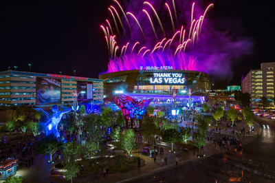 T-Mobile Arena GO_Fireworks Photo Credit Al Powers: Fireworks illuminate T-Mobile Arena and The Park, a dining and entertainment district leading up to the arena from the Las Vegas Strip. Bliss Dance, lit in blue, is one of The Park's inspiring art installations and was designed by artist Marco Cochrane to embody feminine power. Photo credit: Al Powers