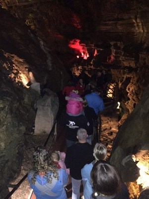 Wounded Warrior Project Alumni and their families explore the depths of Howe Caverns during an Alumni program event.
