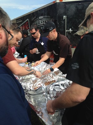 Wounded veterans learn BBQ skills during a Wounded Warrior Project event in North Carolina.