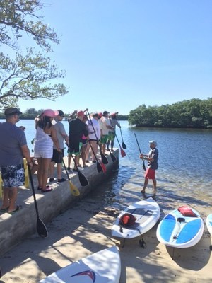 Injured veterans and their families received a history of stand up paddleboarding and learned techniques to hone their skills.