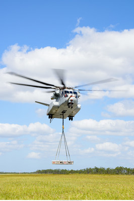 The CH-53K King Stallion helicopter achieves its first flight with an external load at Sikorsky's Development Flight Test Center in West Palm Beach, FL.