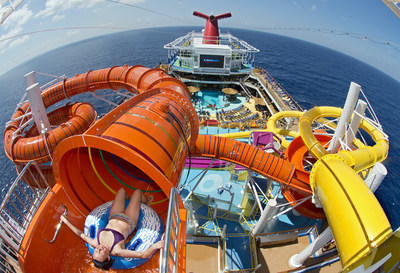 A guest prepares for an exhilarating ride down the Kaleid-O-Slide, a 455-foot-long tube slide on the new Carnival Vista which entered service this week in Europe.   Carnival Cruise Line's newest, largest and most innovative ship begins year-round Caribbean sailings from Miami in November 2016.