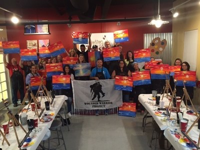 Wounded veterans and their family paint Florida sunsets.