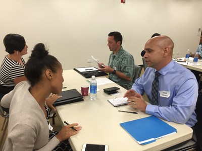 Wounded veterans get feedback during a job interview workshop in Hawaii.