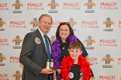 Texas Scottish Rite Hospital for Children President and CEO Robert L. Walker and Cotton Patch Cafe (Lewisville, Texas) Operating Partner Amy Masey with son, Dylan, at the restaurant company's March to a Million campaign kick-off event in March 2016. The company met its 10-year goal to donate more than $1 million to the hospital that treats children regardless of their families' ability to pay.